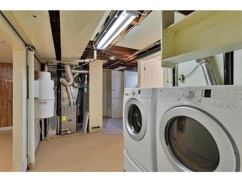 9831 Alcott Road Se, Calgary, AB - Indoor Photo Showing Laundry Room