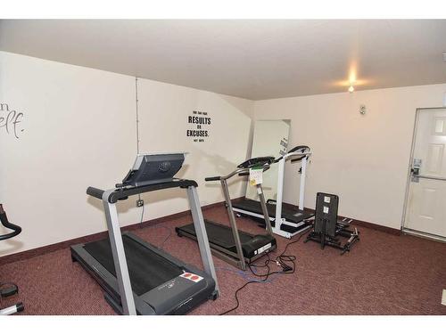 2747 Dovely Park Se, Calgary, AB - Indoor Photo Showing Gym Room