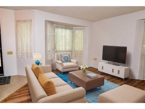 2747 Dovely Park Se, Calgary, AB - Indoor Photo Showing Living Room