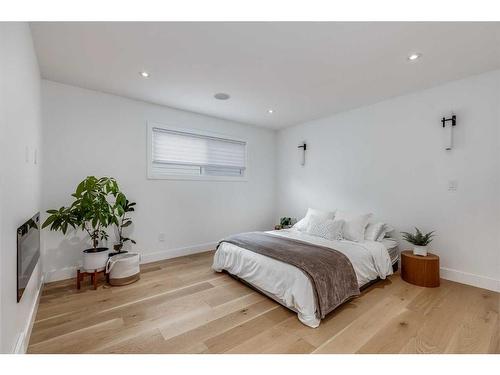 9135 Allison Drive Se, Calgary, AB - Indoor Photo Showing Bedroom