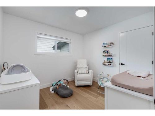 9135 Allison Drive Se, Calgary, AB - Indoor Photo Showing Bedroom