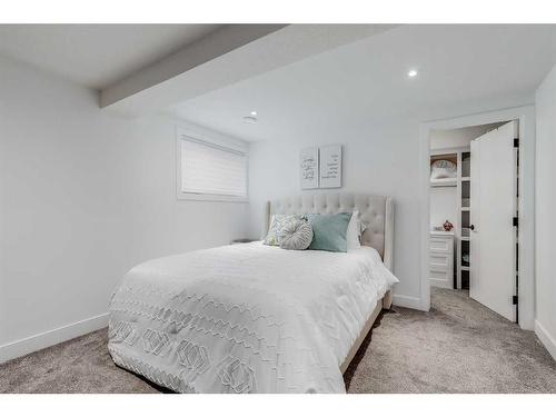 9135 Allison Drive Se, Calgary, AB - Indoor Photo Showing Bedroom