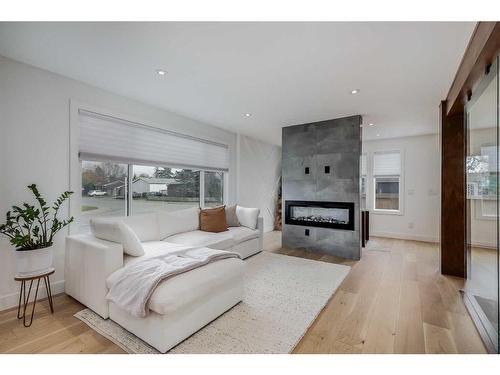 9135 Allison Drive Se, Calgary, AB - Indoor With Fireplace