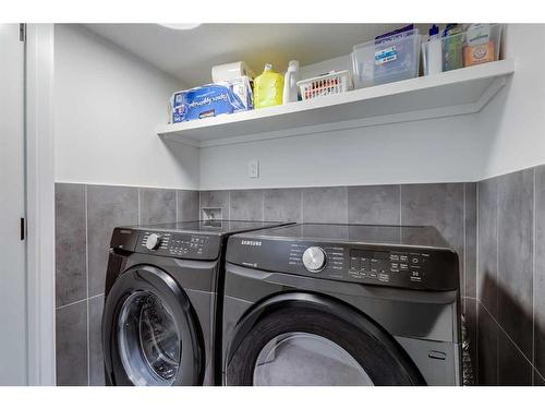 9135 Allison Drive Se, Calgary, AB - Indoor Photo Showing Laundry Room