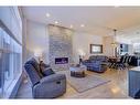 347 Masters Row Se, Calgary, AB  - Indoor Photo Showing Living Room With Fireplace 