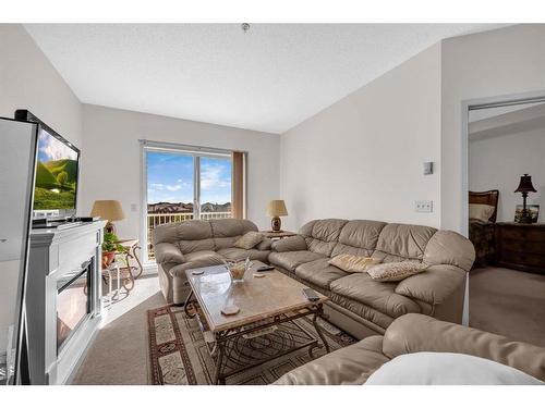 1315-1140 Taradale Drive Ne, Calgary, AB - Indoor Photo Showing Living Room