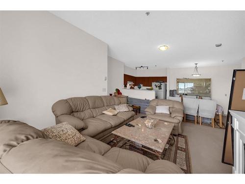 1315-1140 Taradale Drive Ne, Calgary, AB - Indoor Photo Showing Living Room