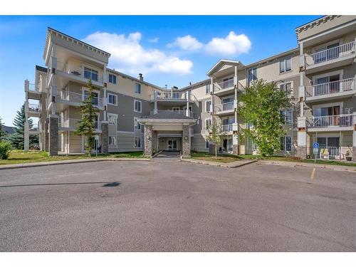 1315-1140 Taradale Drive Ne, Calgary, AB - Outdoor With Balcony With Facade