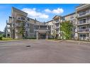 1315-1140 Taradale Drive Ne, Calgary, AB  - Outdoor With Balcony With Facade 