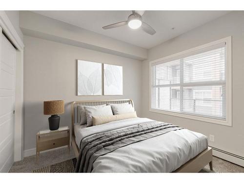 207-19661 40 Street Se, Calgary, AB - Indoor Photo Showing Bedroom