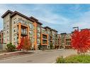 207-19661 40 Street Se, Calgary, AB  - Outdoor With Balcony With Facade 