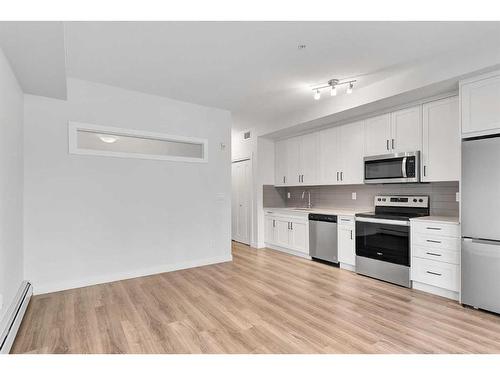 113-40 Walgrove Se, Calgary, AB - Indoor Photo Showing Kitchen