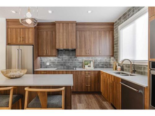 92 Silverton Glen Green Sw, Calgary, AB - Indoor Photo Showing Kitchen With Double Sink