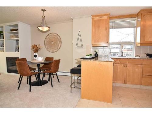 #402,-4554 Valiant Drive Nw, Calgary, AB - Indoor Photo Showing Dining Room