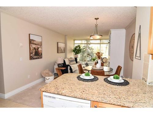 #402,-4554 Valiant Drive Nw, Calgary, AB - Indoor Photo Showing Dining Room