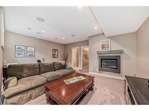 4623 81 Street Nw, Calgary, AB - Indoor Photo Showing Living Room With Fireplace