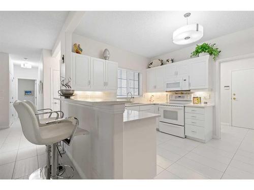 303 Patterson View Sw, Calgary, AB - Indoor Photo Showing Kitchen