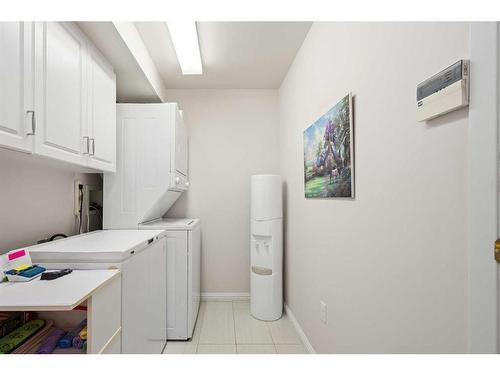 303 Patterson View Sw, Calgary, AB - Indoor Photo Showing Laundry Room