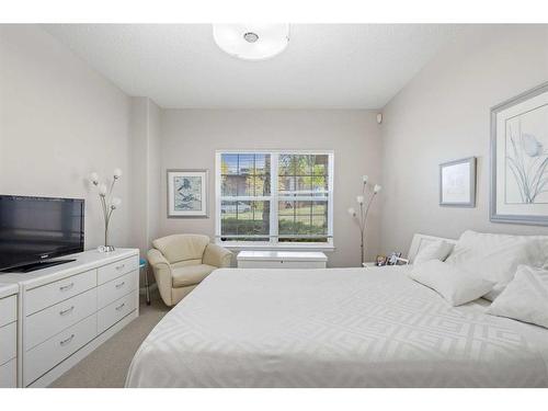 303 Patterson View Sw, Calgary, AB - Indoor Photo Showing Bedroom