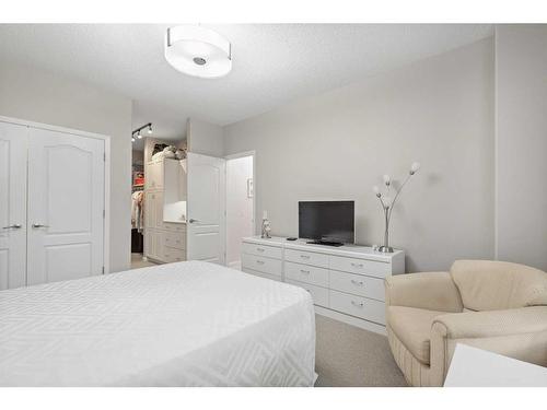 303 Patterson View Sw, Calgary, AB - Indoor Photo Showing Bedroom