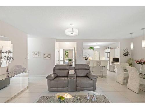 303 Patterson View Sw, Calgary, AB - Indoor Photo Showing Living Room