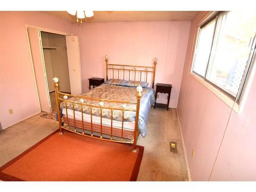 143 Silver Ridge Rise Nw, Calgary, AB - Indoor Photo Showing Bedroom