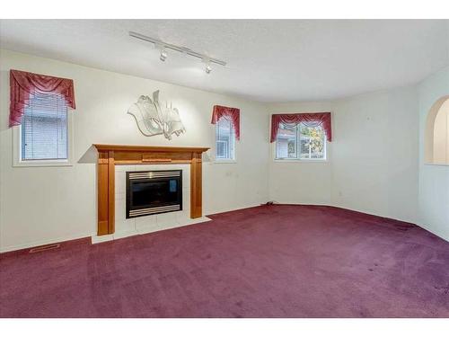 718 Centre Street, Vulcan, AB - Indoor With Fireplace