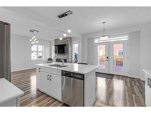 366 Windrow Crescent Sw, Airdrie, AB - Indoor Photo Showing Kitchen With Double Sink