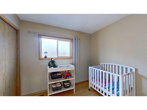 245 Harvest Hills Drive Ne, Calgary, AB - Indoor Photo Showing Bedroom