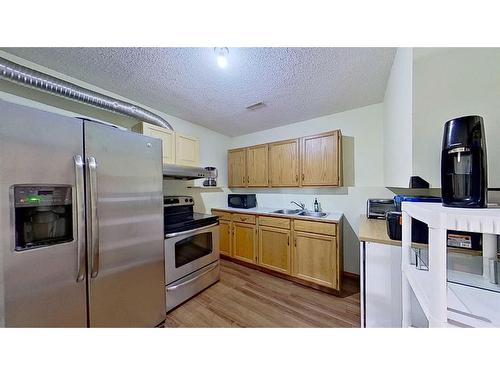 245 Harvest Hills Drive Ne, Calgary, AB - Indoor Photo Showing Kitchen With Double Sink