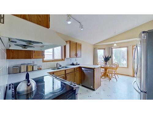 245 Harvest Hills Drive Ne, Calgary, AB - Indoor Photo Showing Kitchen With Double Sink