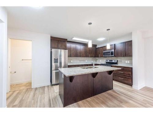 431 Redstone View Ne, Calgary, AB - Indoor Photo Showing Kitchen With Stainless Steel Kitchen With Double Sink With Upgraded Kitchen