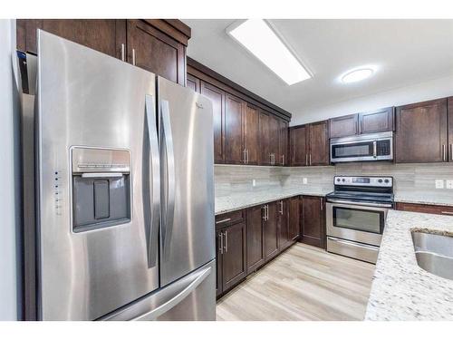 431 Redstone View Ne, Calgary, AB - Indoor Photo Showing Kitchen With Stainless Steel Kitchen With Double Sink With Upgraded Kitchen