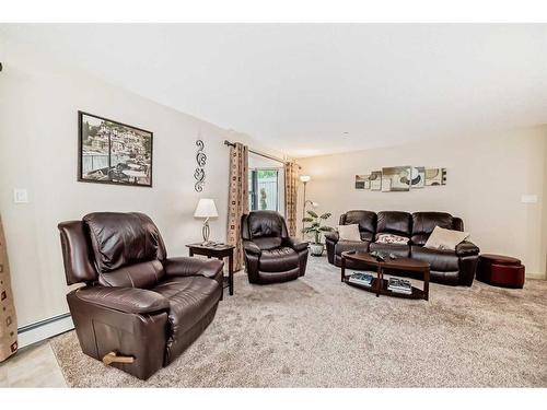 105-3719B 49 Street Nw, Calgary, AB - Indoor Photo Showing Living Room