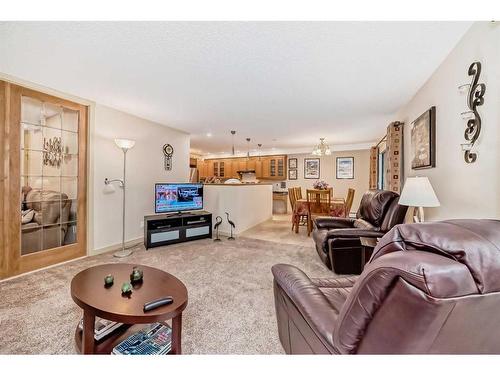 105-3719B 49 Street Nw, Calgary, AB - Indoor Photo Showing Living Room