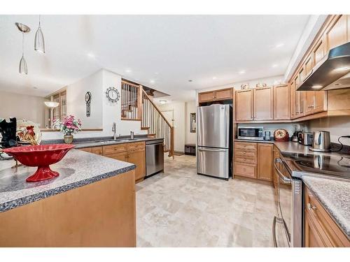 105-3719B 49 Street Nw, Calgary, AB - Indoor Photo Showing Kitchen With Double Sink