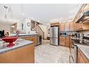 105-3719B 49 Street Nw, Calgary, AB  - Indoor Photo Showing Kitchen With Double Sink 