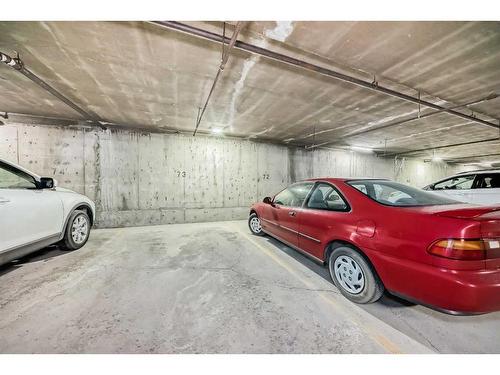 105-3719B 49 Street Nw, Calgary, AB - Indoor Photo Showing Garage