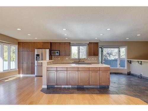 128 Deer Side Place Se, Calgary, AB - Indoor Photo Showing Kitchen With Double Sink