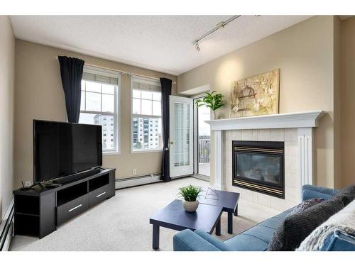 5412-14645 6 Street Sw, Calgary, AB - Indoor Photo Showing Living Room With Fireplace