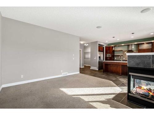 117 Kincora Place Nw, Calgary, AB - Indoor With Fireplace