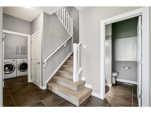 117 Kincora Place Nw, Calgary, AB - Indoor Photo Showing Laundry Room