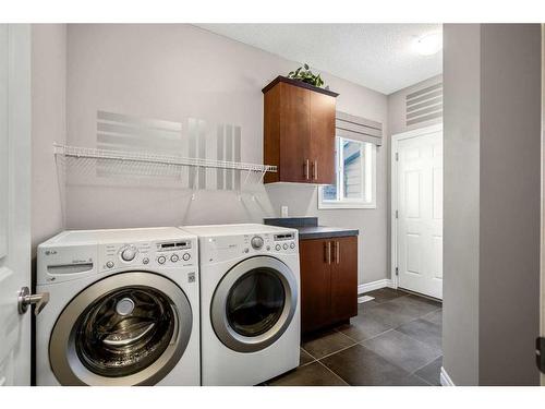 117 Kincora Place Nw, Calgary, AB - Indoor Photo Showing Laundry Room