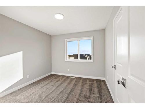 226 Marmot Walk Nw, Calgary, AB - Indoor Photo Showing Other Room