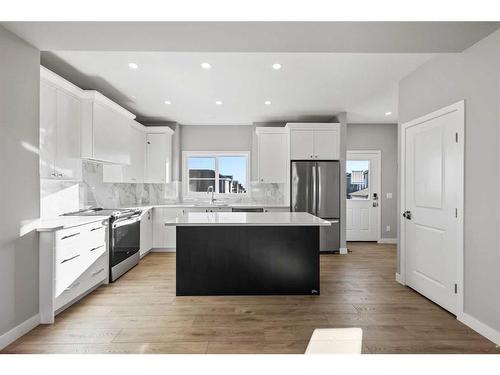 226 Marmot Walk Nw, Calgary, AB - Indoor Photo Showing Kitchen With Upgraded Kitchen