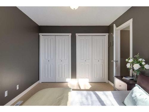 21-6915 Ranchview Drive Nw, Calgary, AB - Indoor Photo Showing Bedroom