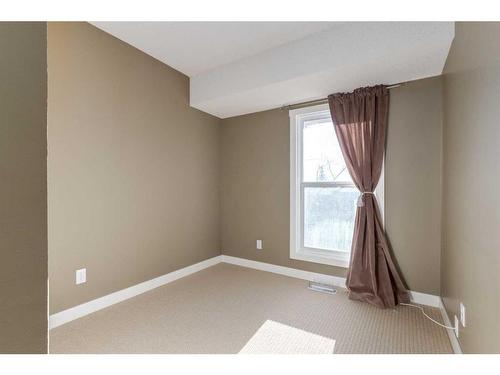 21-6915 Ranchview Drive Nw, Calgary, AB - Indoor Photo Showing Other Room