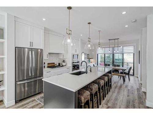 24-130 Discovery Drive Sw, Calgary, AB - Indoor Photo Showing Kitchen With Stainless Steel Kitchen With Upgraded Kitchen