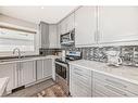 68 Citadel Pass Crescent Nw, Calgary, AB  - Indoor Photo Showing Kitchen With Double Sink With Upgraded Kitchen 