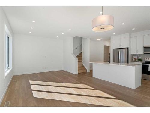 321 Baneberry Way Sw, Airdrie, AB - Indoor Photo Showing Kitchen